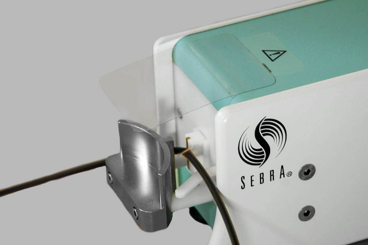 Model 2605, a bench-top automatic sealing head